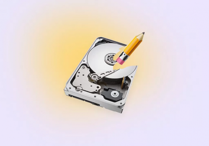 a pencil wiping a hard drive
